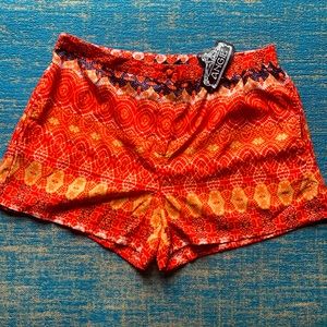 Angie orange geometric lightweight shorts XS NWT